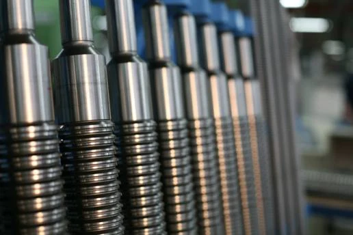 Row of spline broach cutters showing tooth array on the production line at United Broach Company